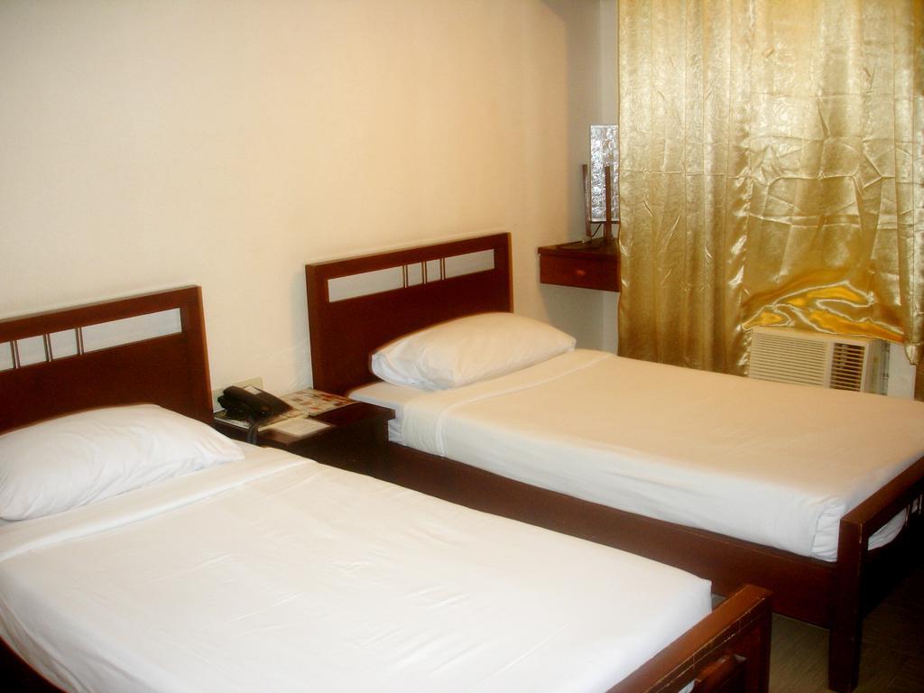 Roxas Midtown Hotel Phòng bức ảnh