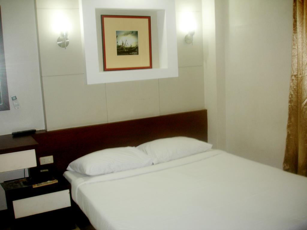 Roxas Midtown Hotel Phòng bức ảnh